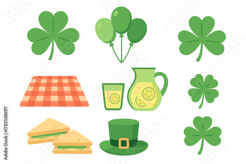Celebration and picnic items set with shamrocks, leprechaun hat, checkered blanket, lemonade, and sandwiches