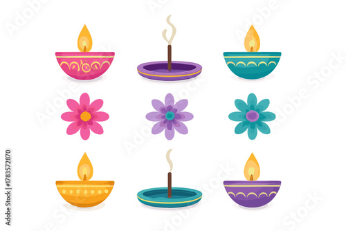 Colorful traditional Indian Diya lamps, incense sticks, and flowers for festive celebration