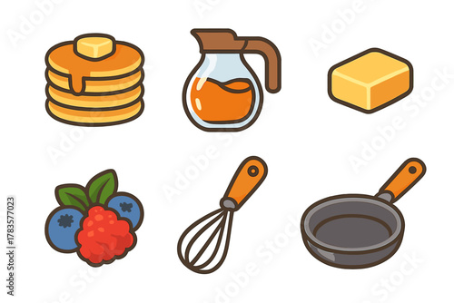 Pancakes stack with butter, syrup, berries, whisk, frying pan, and butter block