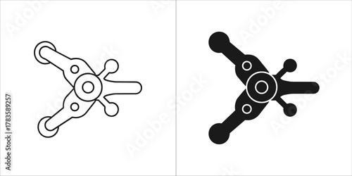 Two stylized icons of a mechanical component, one outlined and one solid black, on a