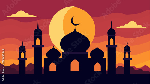 Silhouette of mosque at sunset with moon