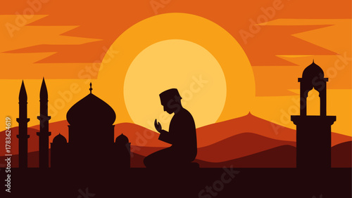 Silhouette of muslim praying at sunset time