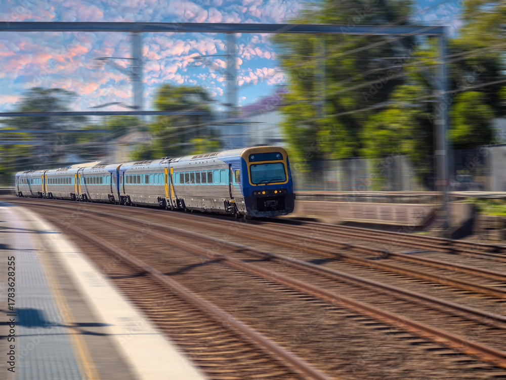 Fototapeta premium Passenger Train going through Summer Hill train station a suburban Sydney train Station NSW Australia