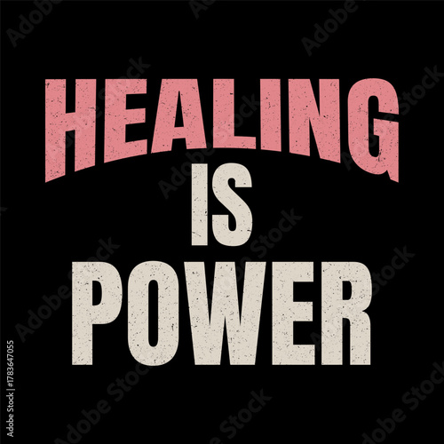 Healing is power motivational phrase with distressed typography on black background