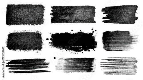 A series of textured black brush strokes arranged in a grid pattern, showcasing different styles and thicknesses.