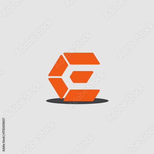 A bold geometric logo crafted in orange hues, reflecting modernity and innovation through its clean shapes and striking visual presence in branding.