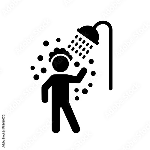 Black glyph icon of a person taking a refreshing shower.