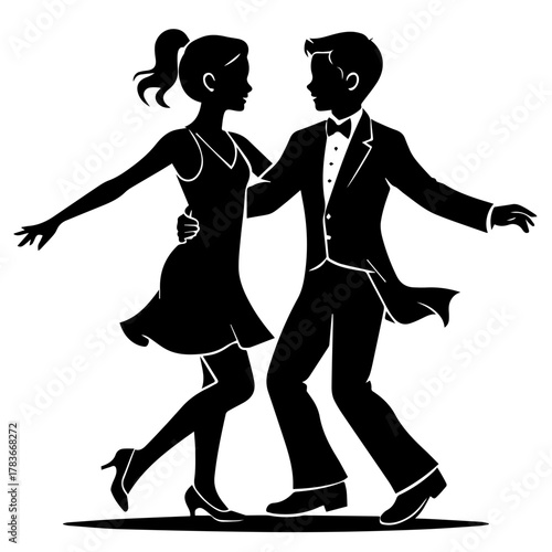 Silhouette of couple dancing elegantly in formal attire  