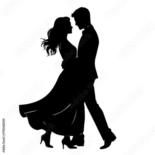 Silhouette of couple dancing romantically in elegant attire  