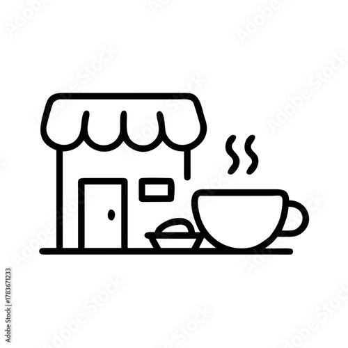 A close up of a black cat with bright green eyes