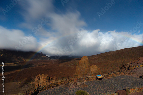 Iconic Roque Cinchado Rock Formation with Rainbow in Teide National Park, Tenerife, Canary Islands