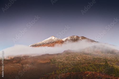 Snow-Capped Teide Volcano Rising Above Sea of Clouds at Twilight, Tenerife, Canary Islands