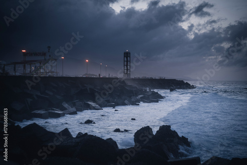 Moody Night Seascape with Lighthouse and Stormy Sky, Tenerife, Canary Islands