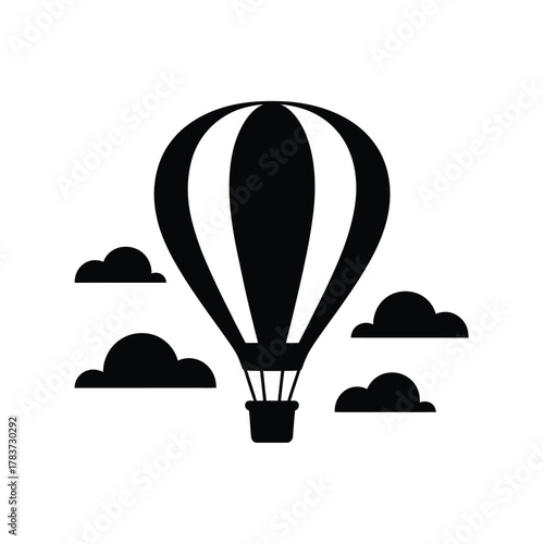 Black and white silhouette of a hot air balloon in the sky with clouds