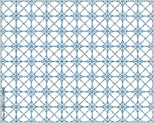 Intricate geometric pattern with blue and white diamond shapes and starburst elements