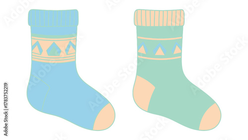 Cozy Socks Duo: Two colorful socks, one sky blue, and the other mint green, each with charming geometric patterns, evoke feelings of comfort and warmth, ready for a day of playful adventures. 