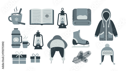 Cozy Winter Essentials: A collection of winter items, including hot drinks, books, and outerwear, that evoke warmth and comfort during the cold season.