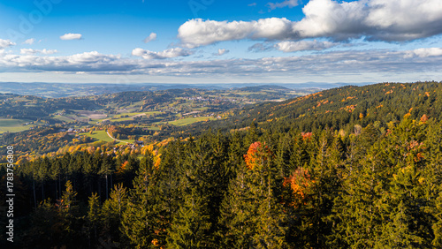 Aerial view of Straubing Bogen district in Bavaria with colorful autumn forests hills and mountain scenery in southern Germany