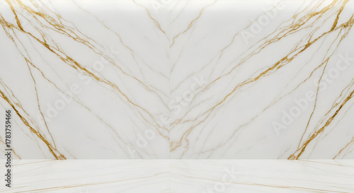 Luxurious marble wall featuring elegant white and gold veining, perfect for upscale interior design. This stunning surface adds sophistication and style to any space