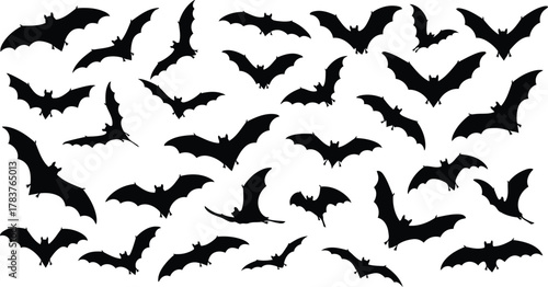 Spooky silhouettes of bats flying for Halloween themed designs and creepy backgrounds, perfect for invitations, posters, decorations, and creative projects