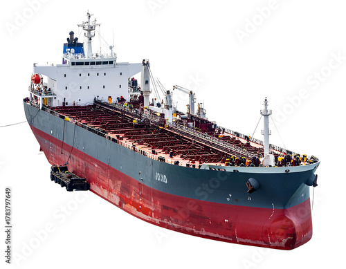 A large oil tanker with a dark hull sits anchored, against a black background, casting no shadow
