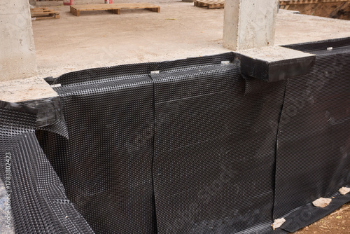 Robust waterproof membrane with drainage and protective features for construction, Heavy-duty moisture barrier with dimpled sheeting and drainage system for building