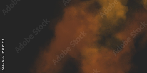 Brown texture. Orange powder explosion on black background. grunge and grainy abstract Flying through stormy brown clouds .