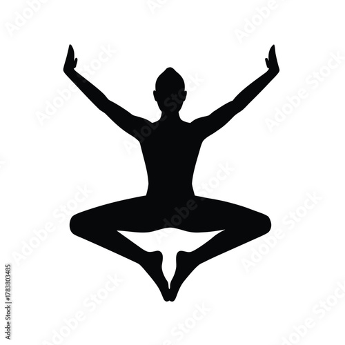 Silhouette of gymnast performing acrobatic yoga pose on white isolated backdrop