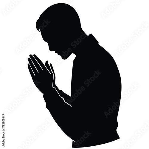 Silhouette of man praying with hands clasped in supplication against white background