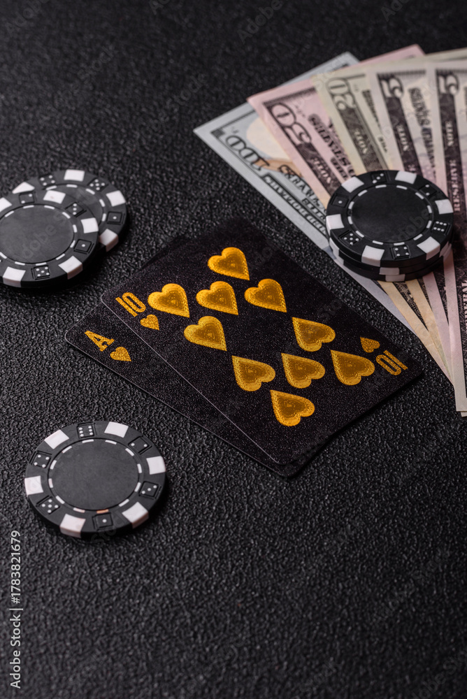 Obraz premium Playing blackjack or baccarat card game in casino with chips. Cards and chips on black felt