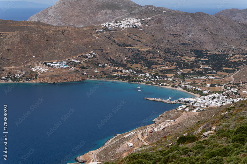 Naklejka premium View of the Aegiali bay, town and beach from above, Amorgos, Cyclades, Greece