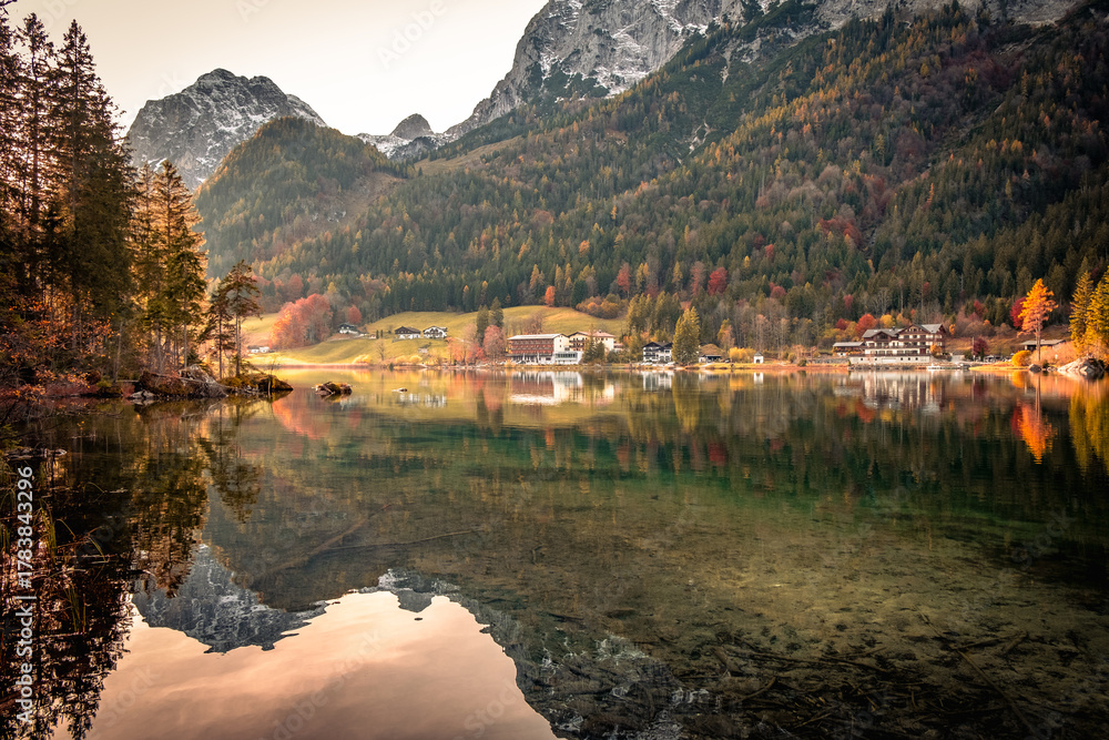 Fototapeta premium Autumn Reflections on a Mountain Lake in the Alps
