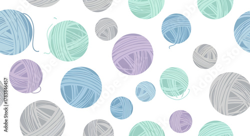 Seamless pattern of colorful yarn balls for knitting and crafts.