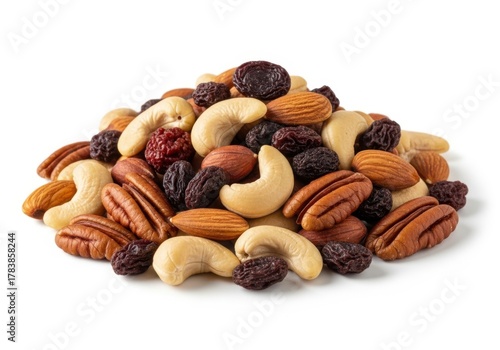 A pile of mixed nuts and dried fruit isolated on white background