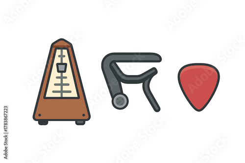 Collection of essential musical accessories including a traditional metronome, guitar capo, and red pick