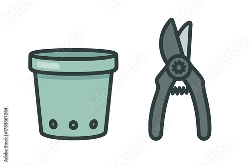 Green plastic planter and gray secateurs used for cutting branches and stems