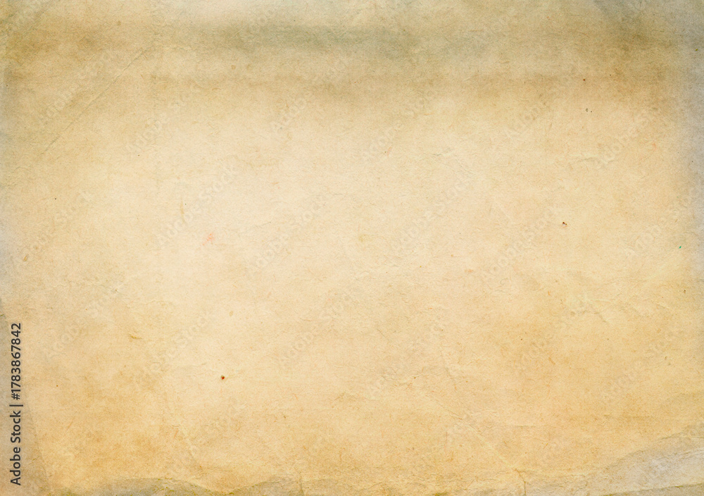 Obraz premium Damaged worn aged paper texture or background.