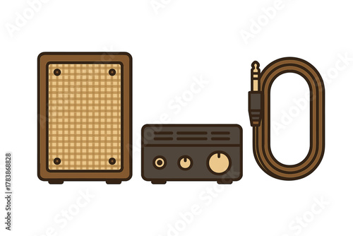 Vintage style guitar amplifier speaker cabinet and coiled audio cable setup for music