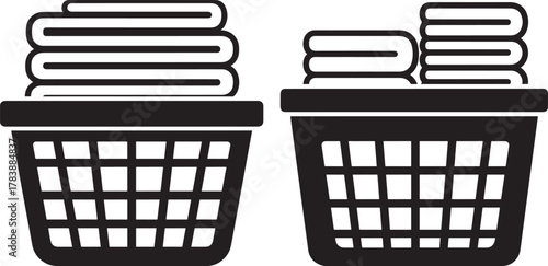Two laundry baskets filled with stacked towels silhouette