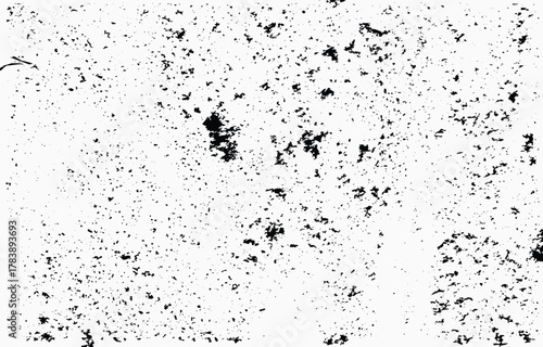 Explore the essence of a grunge texture vector characterized by a mixture of black splatters on a light background, perfect for design projects and artistic endeavors