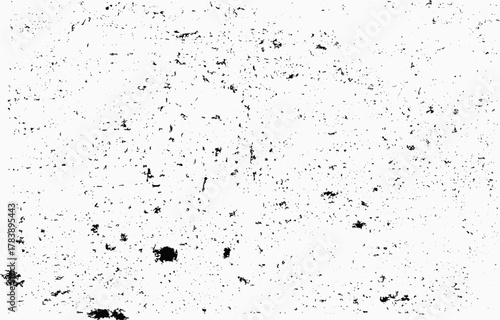 Grunge texture vector design showcasing a distressed surface with dark speckles and varying shades, creating a rugged aesthetic suitable for backgrounds and artistic projects