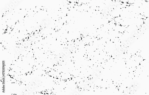 Grunge texture vector featuring a distressed and uneven surface with black and white variations, suitable for various artistic and design projects