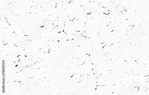 Grunge texture vector suitable for backgrounds, designs, and artistic projects featuring a rough and textured appearance with speckles and irregular patterns