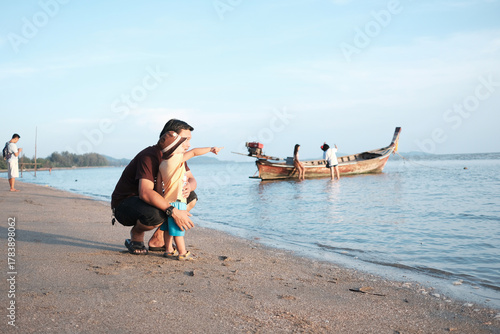 Father and Son's Serene Beach Adventure