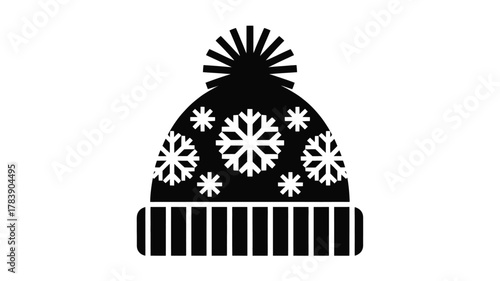 A black and white graphic silhouette of a knitted winter beanie hat adorned with snowflake patterns and a pom pom on top perfect for seasonal designs silhouette