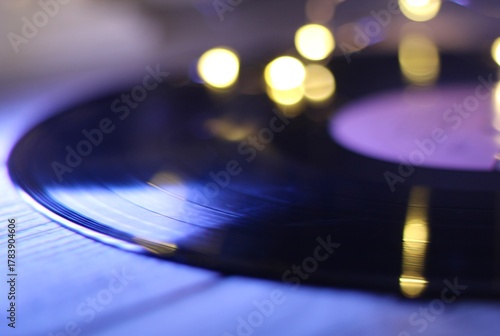 Vinyl disc and lights festive photo bokeh artistic background retro style	