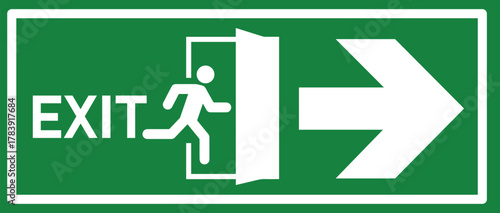 Green emergency exit sign with running person and right arrow