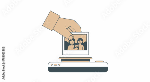 A hand using a digital scanner to preserve an old family photograph