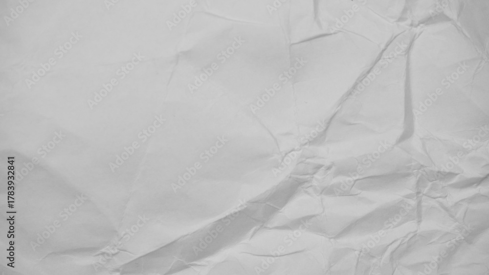 Fototapeta premium White crumpled paper texture — wrinkled background for design
