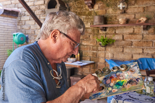 Senior Man painting